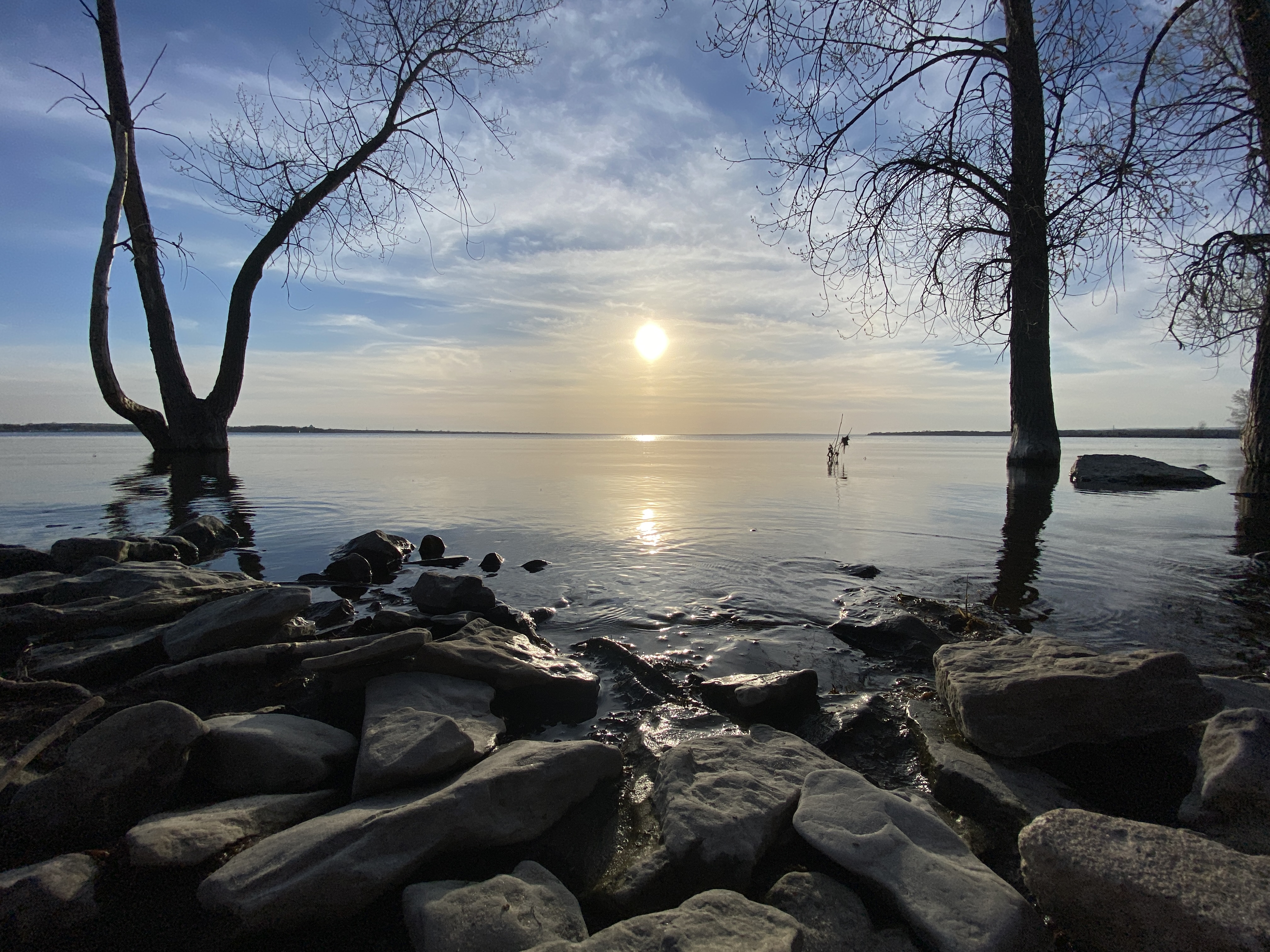 A body of rocks leading into the water