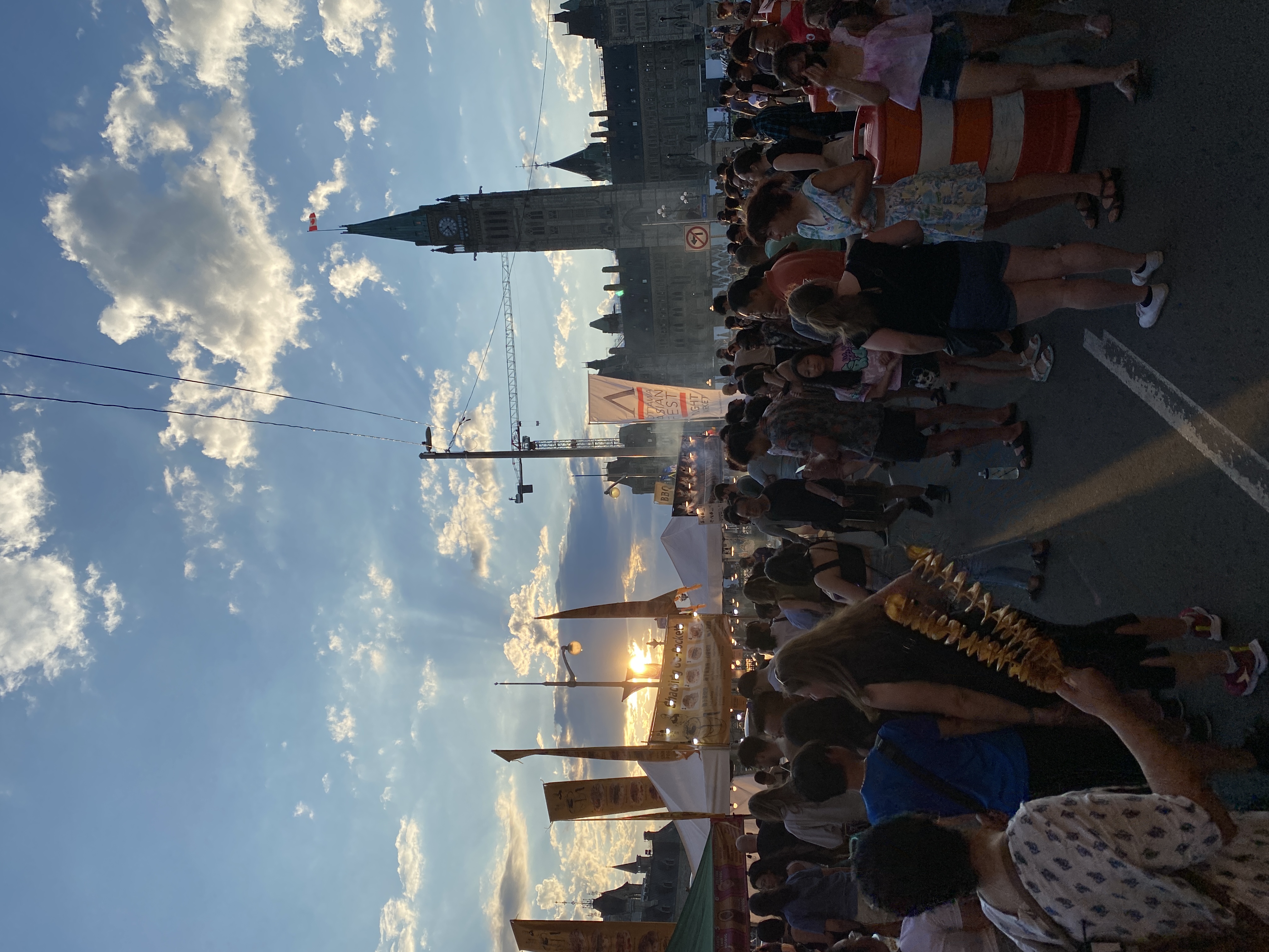 Crowd in front of Parliament Hill enjoying food